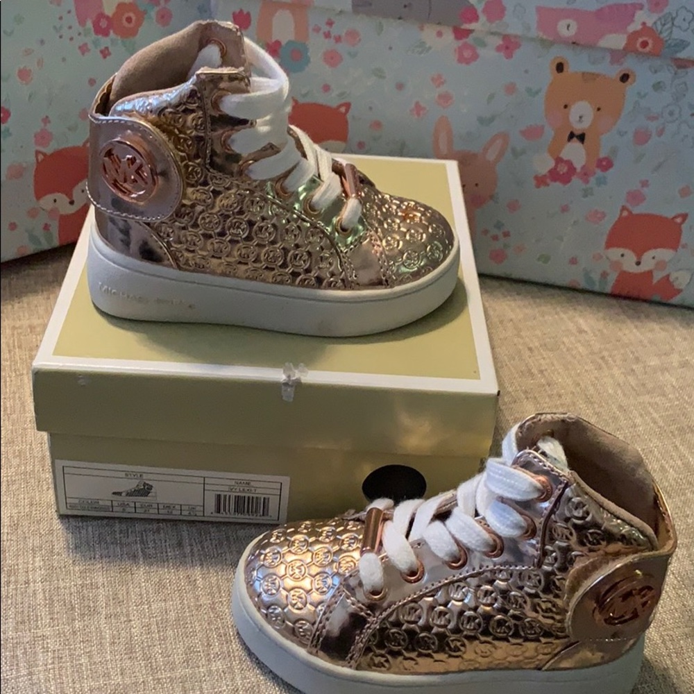 Adorable Michael Kors embossed high tops